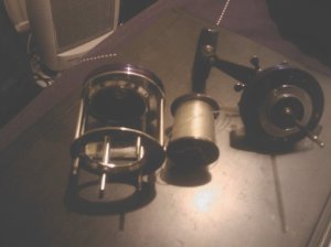 3. The 3 main components, separated. Cage (with non-drive side plate, spool, and drive side plate 3. The 3 main components, separated. Cage (with non-drive side plate, spool, and drive side plate